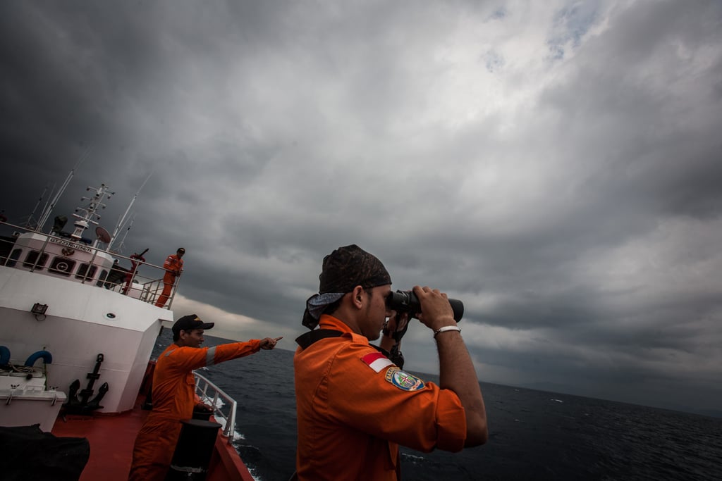 Indonesian search workers looked for any sign of the missing plane in the Andaman Sea on Saturday.