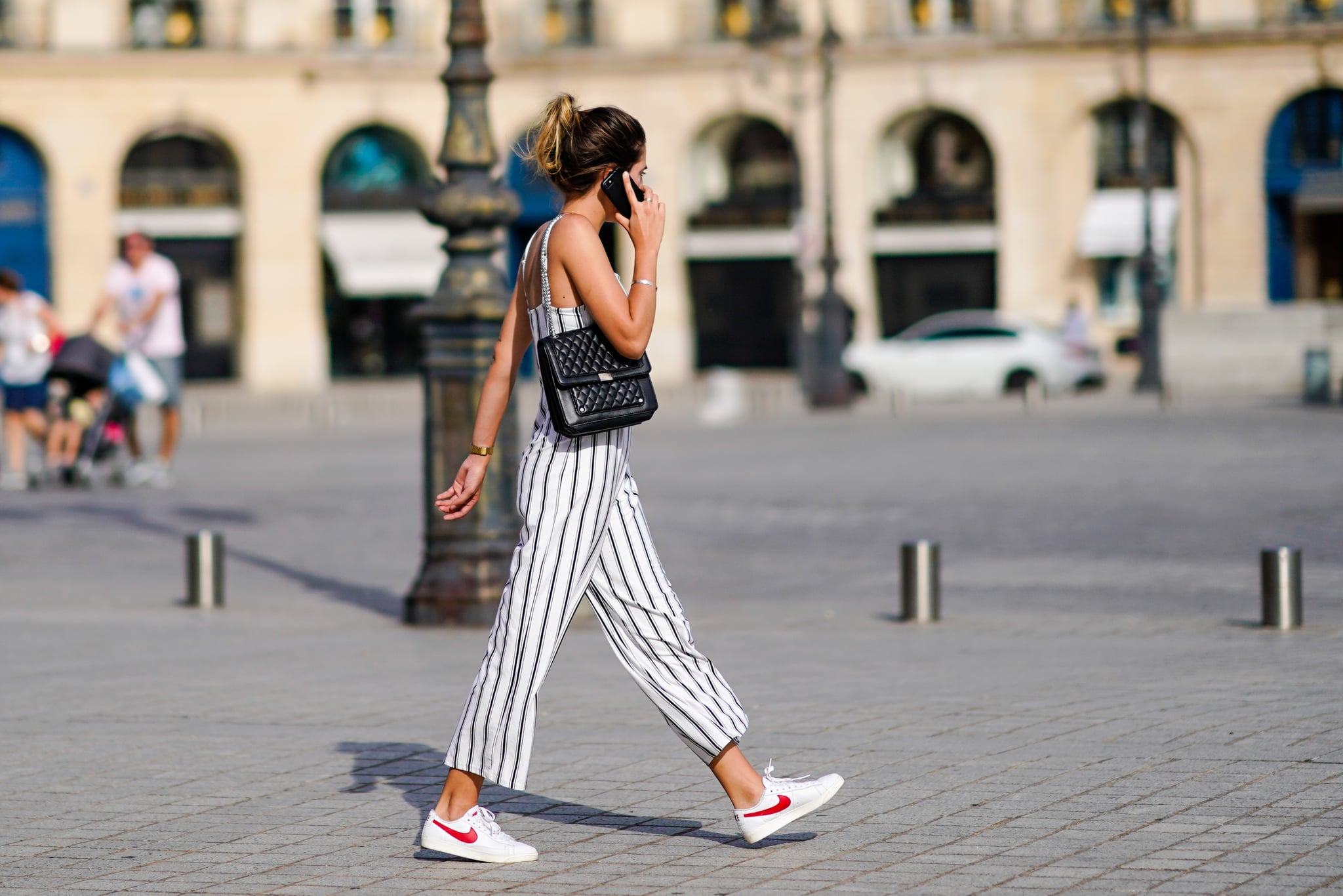 White jumpsuit | White sneakers, Street style summer, Romper and sneakers