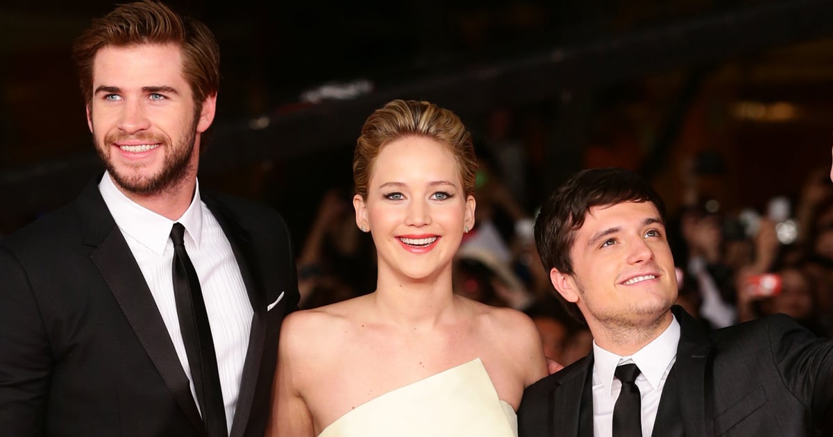 Jennifer Lawrence shouts 'Hunger Games' with teammates Liam Hemsworth and Josh Hutcherson