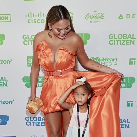 See Chrissy Teigen's Orange Dress at Global Citizen Vax Live