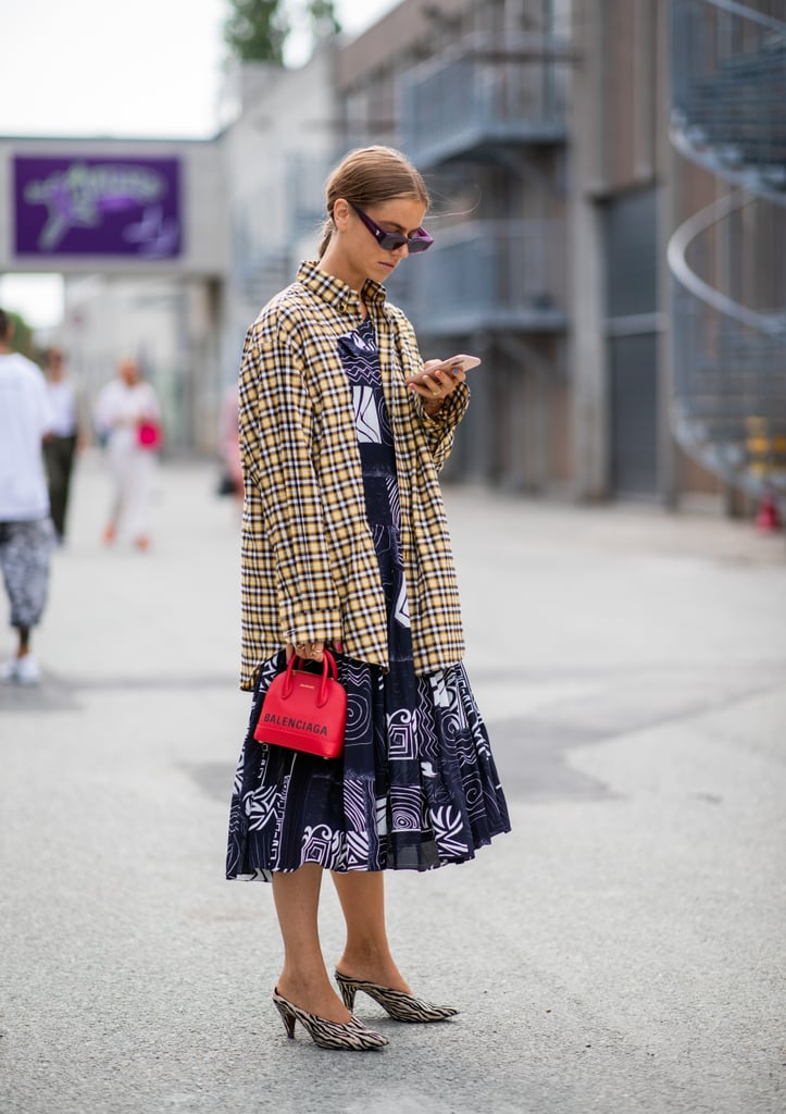 Let a plaid button-down warm up a Summer day dress.