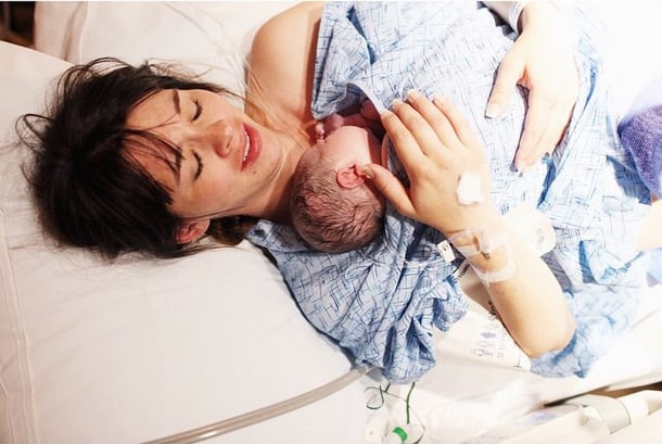 The baby went right to skin-to-skin without hardly making a sound. At that point the Midwife reminded the entire team that studies show this is incredibly important to do because it calms the baby since the heartbeat is the sound he/she knows best.