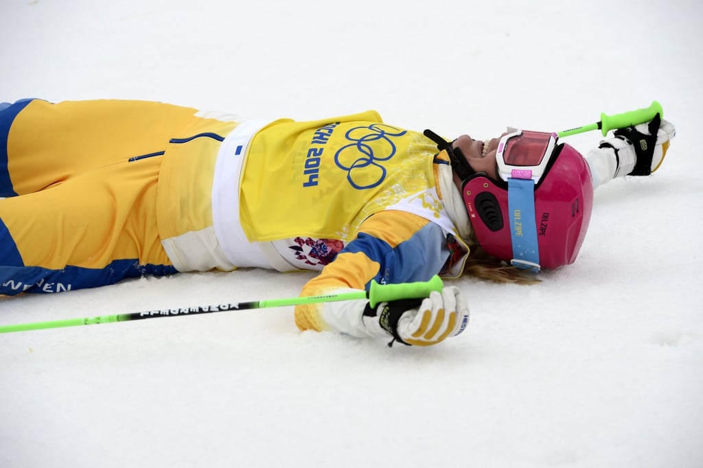 Bronze medallist Anna Holmlund of Sweden celebrated at the women's freestyle skiing ski cross finals.