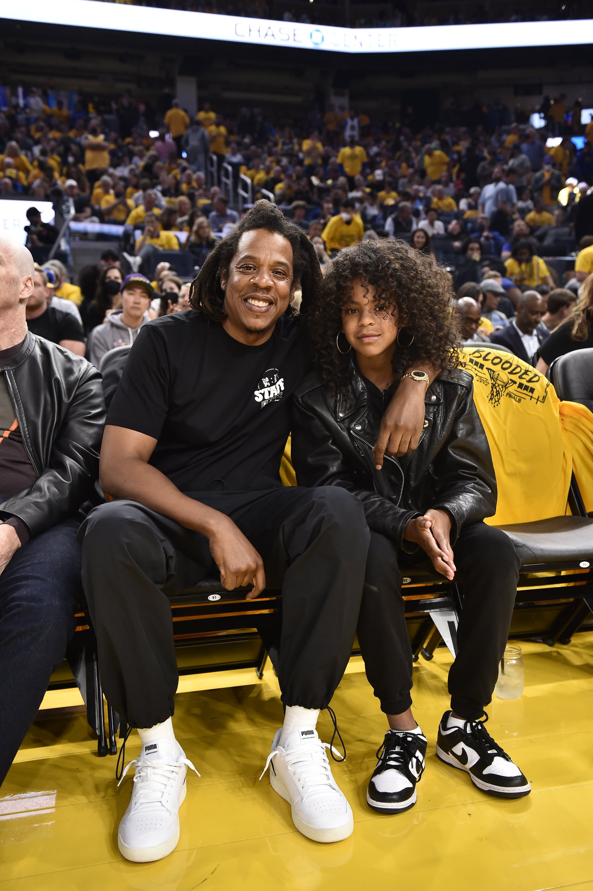 SAN FRANCISCO, CA - JUNE 13: Jay-Z and his daughter Blue Ivy Carter poses for a photo during the game of the Boston Celtics against the Golden State Warriors during Game Five of the 2022 NBA Finals on June 13, 2022 at Chase Center in San Francisco, California. NOTE TO USER: User expressly acknowledges and agrees that, by downloading and or using this photograph, user is consenting to the terms and conditions of Getty Images License Agreement. Mandatory Copyright Notice: Copyright 2022 NBAE (Photo by David Dow/NBAE via Getty Images)