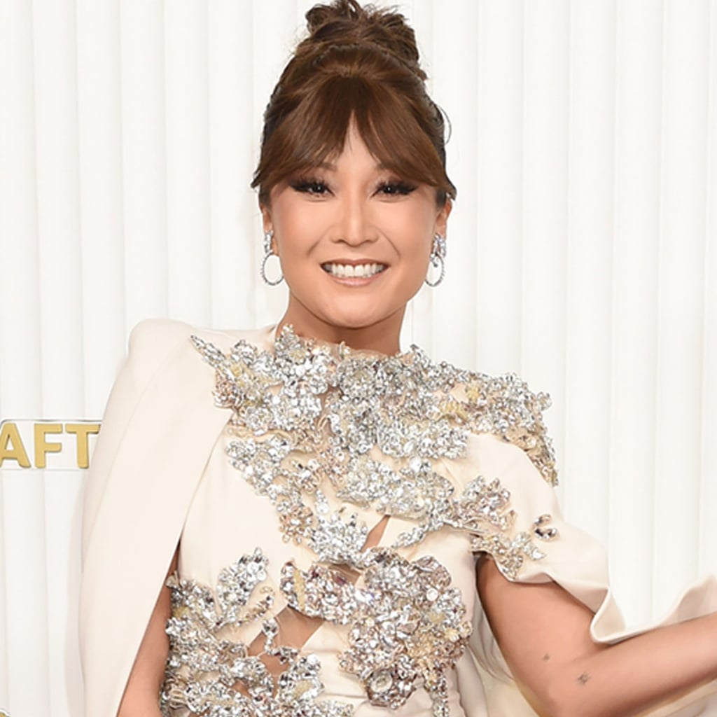 Ashley Park Walks the SAG Awards Red Carpet in an Embellished Ankle Brace