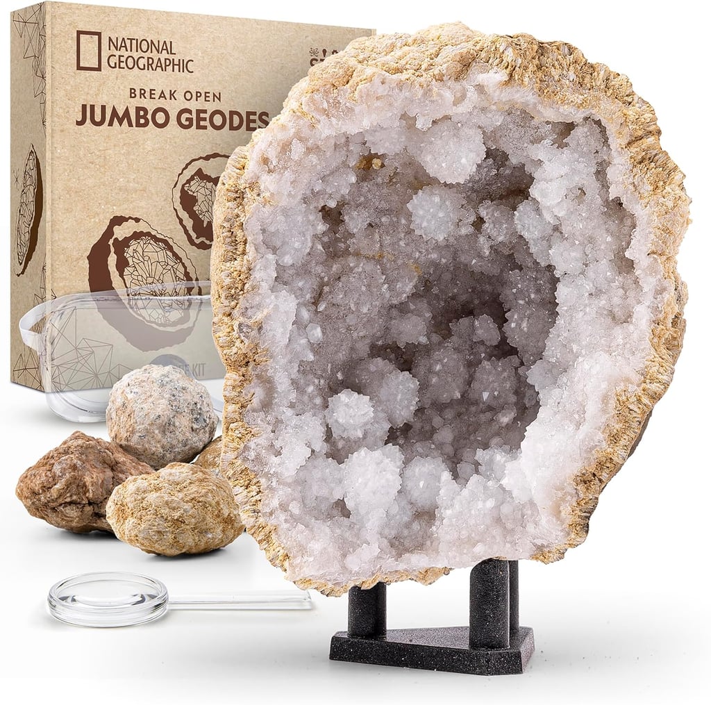 National Geographic Break Open 5 Jumbo Geodes Earth Science Kit ($40)
If you're shopping for the kiddo who's showing interest in collecting rocks, this earth science kit will be an incredible treat. With this set, they'll be able to get hands on experience with breaking geodes and uncovering crystals. Plus, the set comes with display stands too so they can proudly showcase their discoveries.