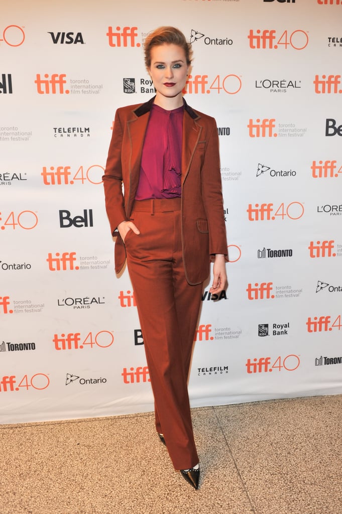 She wore this orange and brown suit set to the 2015 Toronto International Film Festival. Her pantsuit collection is endless.