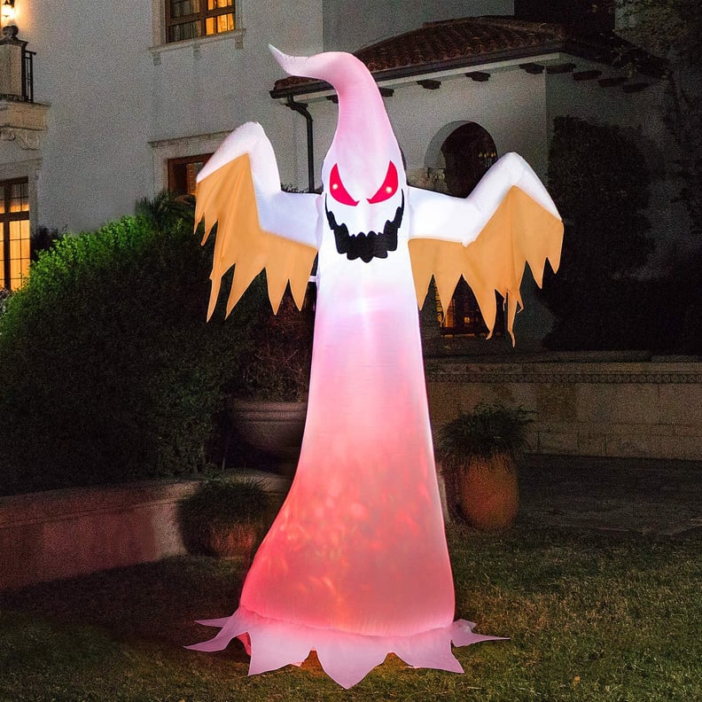 For a Scary Welcome: VivoHome Inflatable White Ghost with Red LED Lights Outdoor Decoration