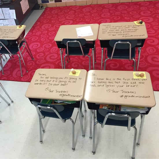 Teacher Writes Notes on Students' Desks Before Test