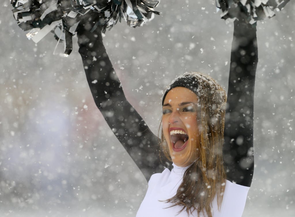 A Philadelphia Eagles cheerleader braved the snowy weather during the team's game against the Detroit Lions in Pennsylvania.