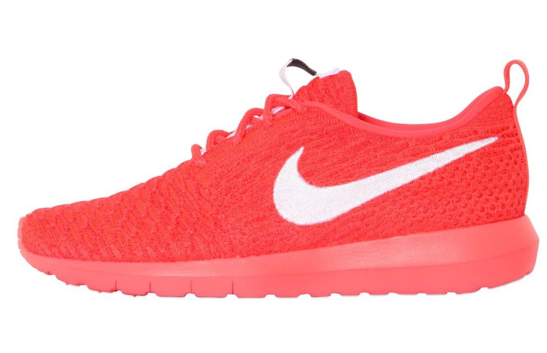 coral color nike shoes