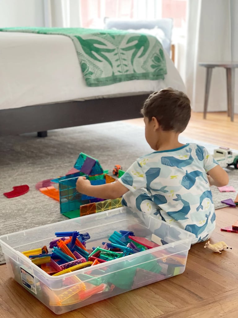 MAGNA-TILES Classic 100-Piece Magnetic Construction Set ($84, originally $120)
If you have a budding engineer on your hands, nothing will delight them more than a set of MAGNA-TILES. The magnetic shapes can be used as building blocks to form everything from elaborate marble runs to rocket ships and buildings. Our editor purchased this set for her kids and says it's "the most-used gift I've ever bought my kids." For more details, read this MAGNA-TILES Classic 100-Piece Magnetic Construction Set review.
Editor Quote: "Depending on his mood, my 4-year-old might surround his wooden barn with a Magna-Tiles gate filled with farm animals or line up Hot Wheels cars on a Magna-Tiles ramp he's built — the possibilities really are endless.
It's so cool to see his own wheels turning as he realizes he can create more of the square shapes he might need by sticking two triangles together or construct a bridge that seems to defy gravity, as long as he builds in beam supports. He recently placed a yellow tile over a blue tile, gleefully discovering that it gave him more green tiles for the dinosaur he was constructing." — Angela Elias, former contributing shopping editor