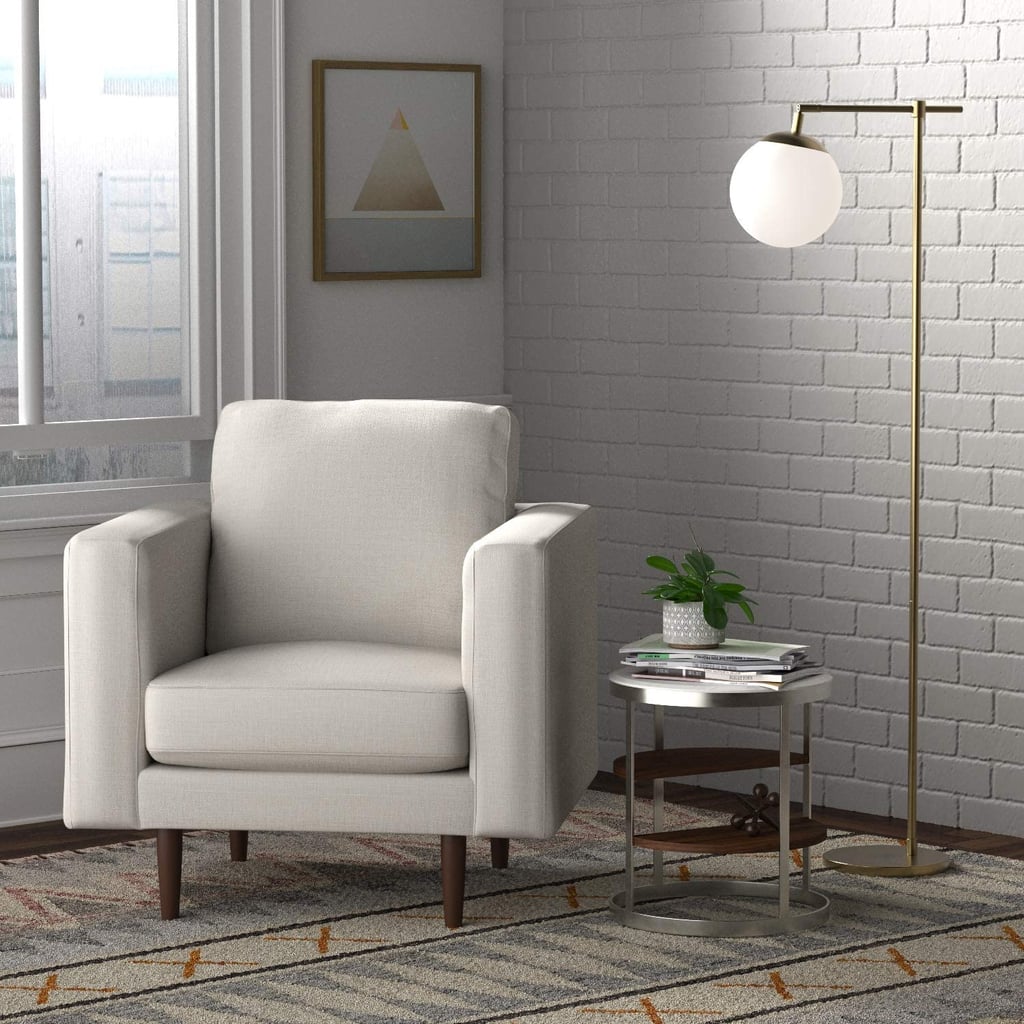 A Modern Armchair: Rivet Revolve Modern Upholstered Armchair