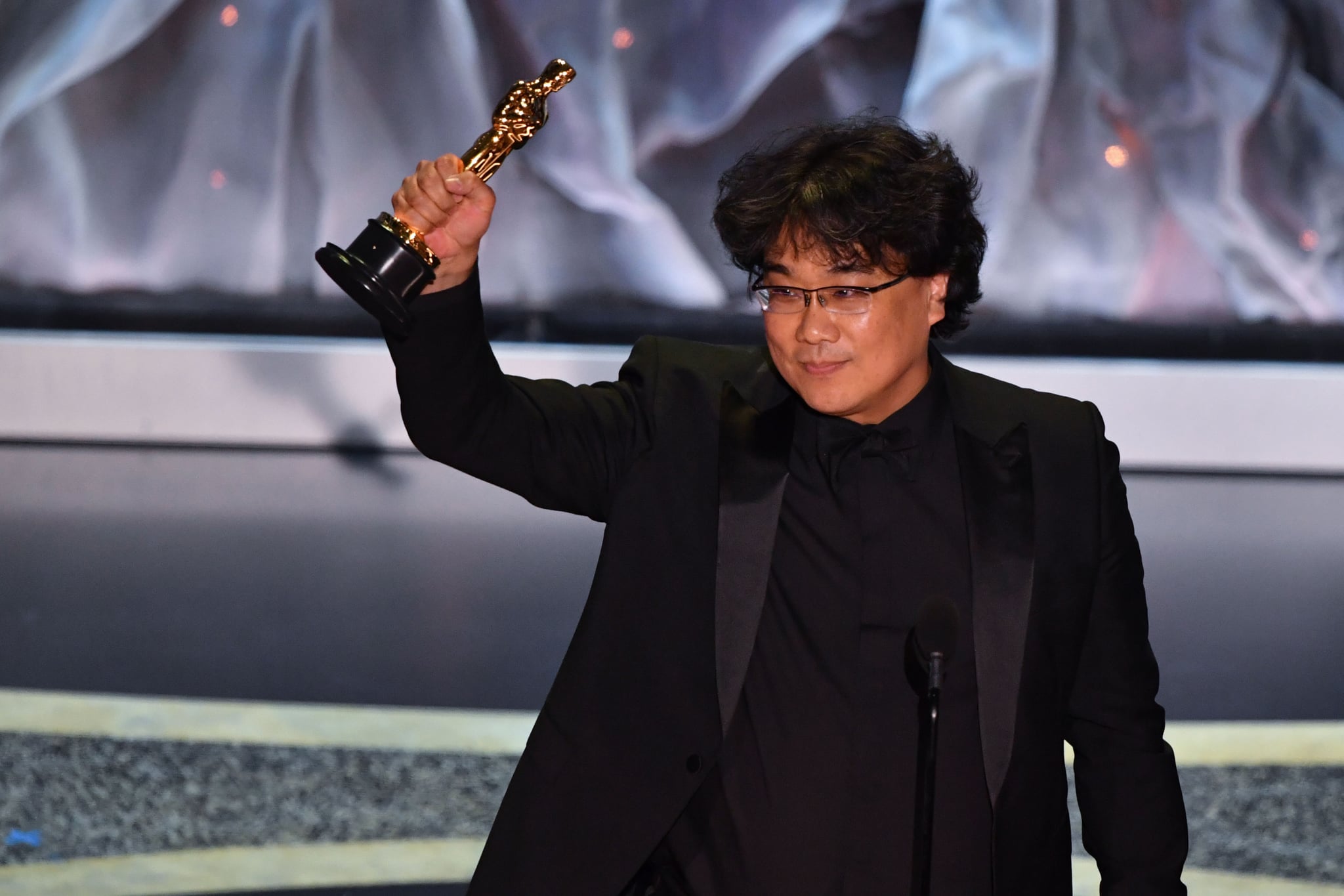 South Korean director Bong Joon-ho accepts the award for Best International Feature Film for 