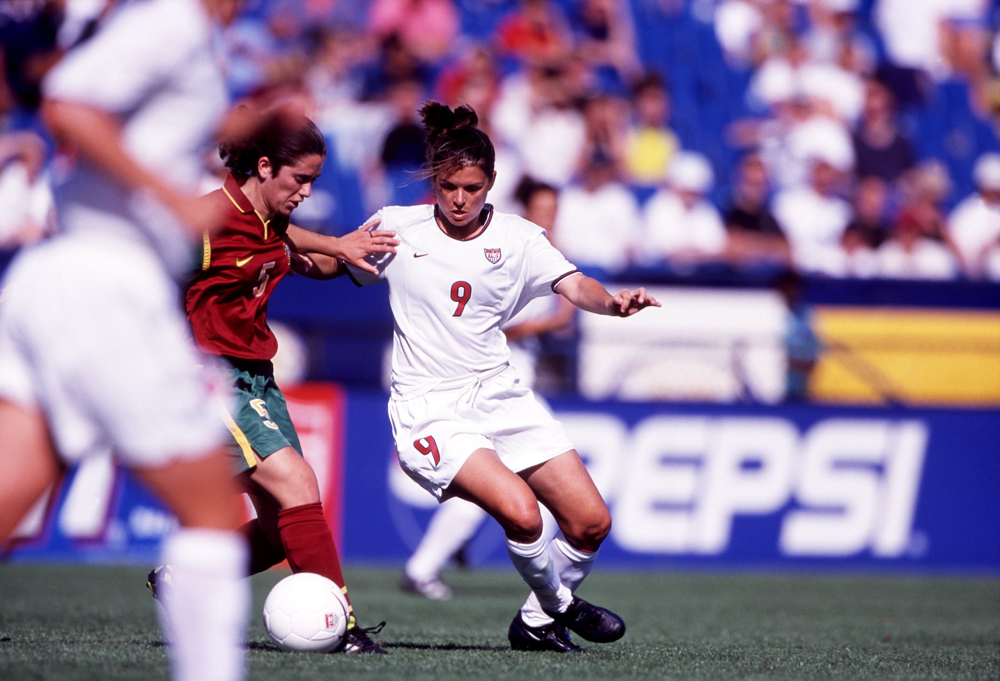 1999:  Mia Hamm #9 of the USA in action during the USA Women's Soccer team's game versus Portugal in Ft. Lauderdale, FL.  (Photo by John Biever/Icon Sportswire via Getty Images)
