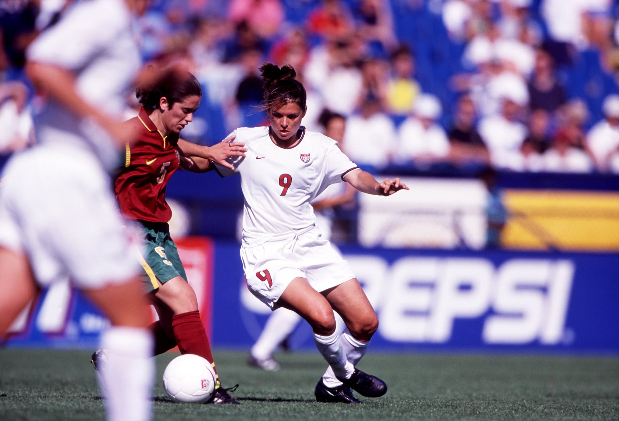 1999:  Mia Hamm #9 of the USA in action during the USA Women's Football team's game versus Portugal in Ft. Lauderdale, FL.  (Photo by John Biever/Icon Sportswire via Getty Images)