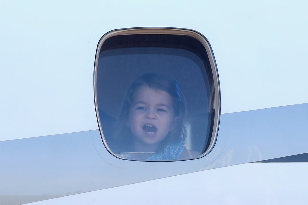 George and Charlotte Looking Out of Plane Windows Pictures