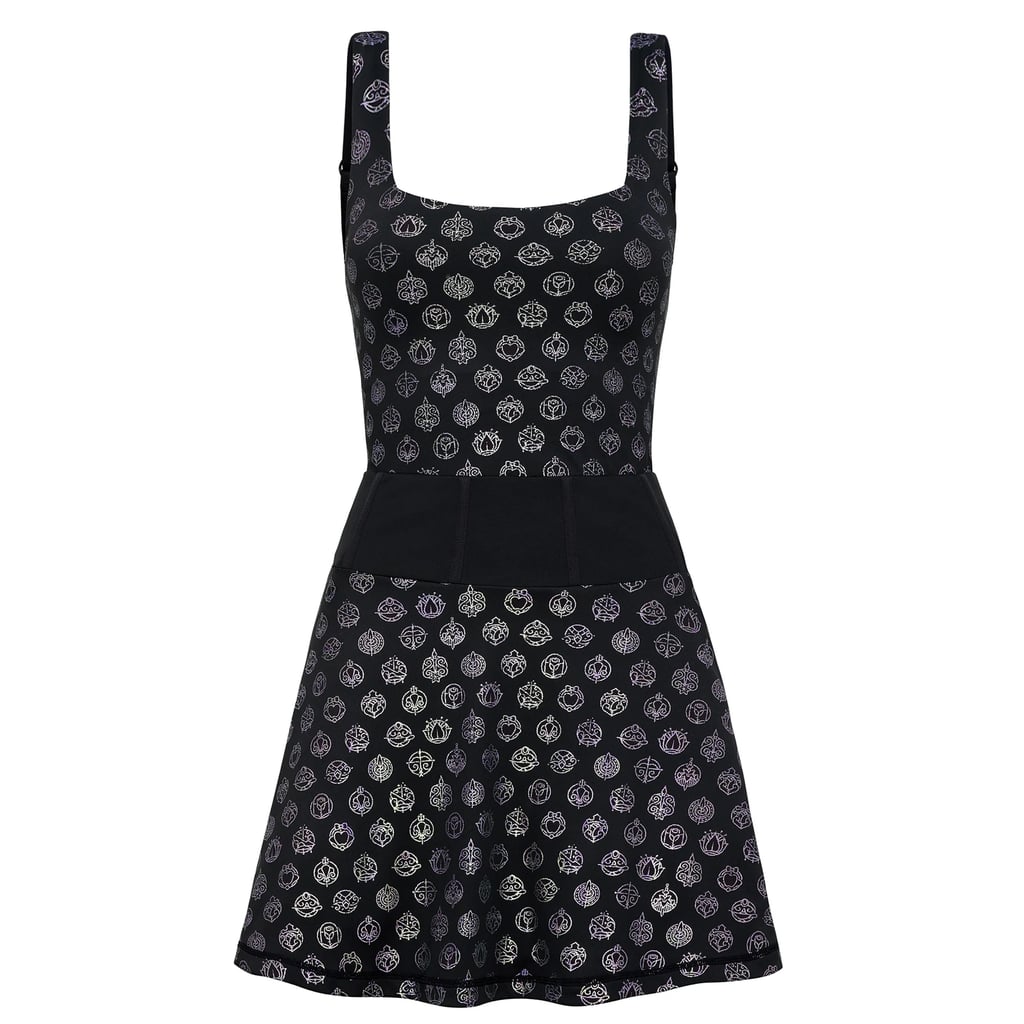 Crowned Athletics Disney Princess Icons Athletic Dress ($128)
We'd sign up for tennis lessons just so that we'd have an excuse to wear this tennis dress more often. Decked out with Disney princess icons, a corset-style back, and a big black bow, it's everything you need to make a powerful statement.