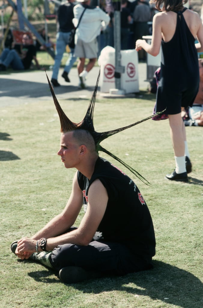 A fan took a quick break on the grass in 1994.