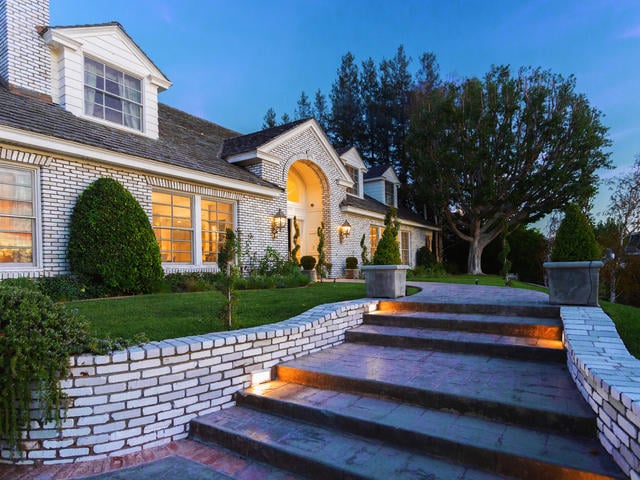 The massive residence is located in one of the most desirable neighborhoods within an elite area of Los Angeles. The massive residence is located in one of the most desirable neighborhoods within an elite area of Los Angeles.