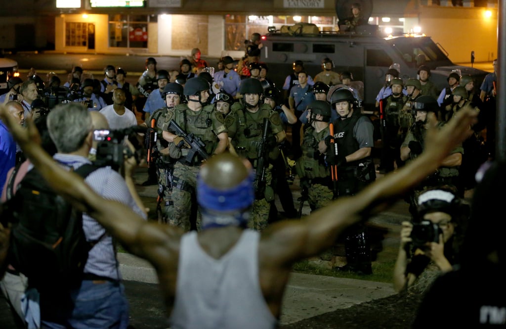 Demonstrators faced off with police in combat gear. Demonstrators faced off with police in combat gear.