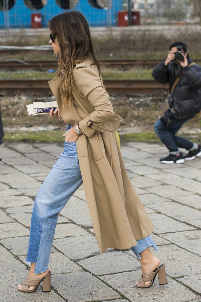 Miroslava Duma wearing Vetements jeans at Milan Fashion Week.