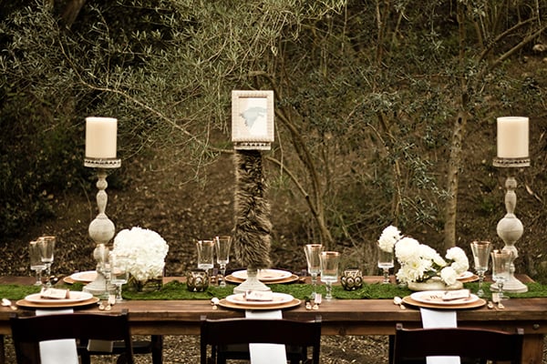 From faux "wolf fur" embellished candlesticks to painted pinecone "dragon eggs" to gold-rimmed goblets, this shoot nailed it.