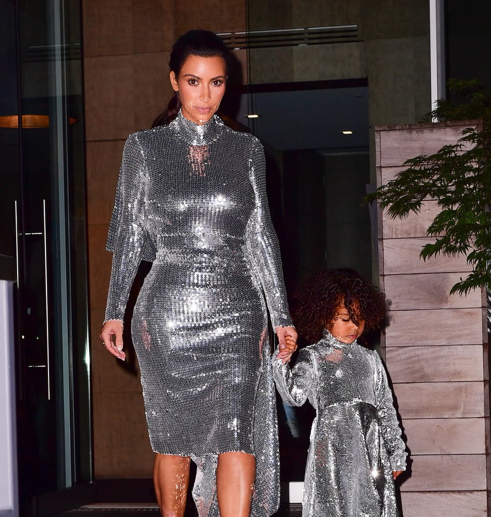 Kim Kardashian and daughter North West shone bright while out in NYC on Monday night. The mother-daughter duo donned matching silver Vetements gowns as they made their way to Kanye West's concert at Madison Square Garden, which also happened to be North's first time attending. On Tuesday, Kim took to Instagram to share photos from their cute outing, writing, "Me & my mini me!" This isn't the first time Kim and North have worn matching outfits. During a trip to Mexico last month, the pair sported matching nude bikinis while on the beach with baby Saint, making for one adorable family moment.  

    Related:

            
                            
                    25 Times North West Was Just Completely, Totally Over It
                
                            
                    70 Supercute Snaps of North West
