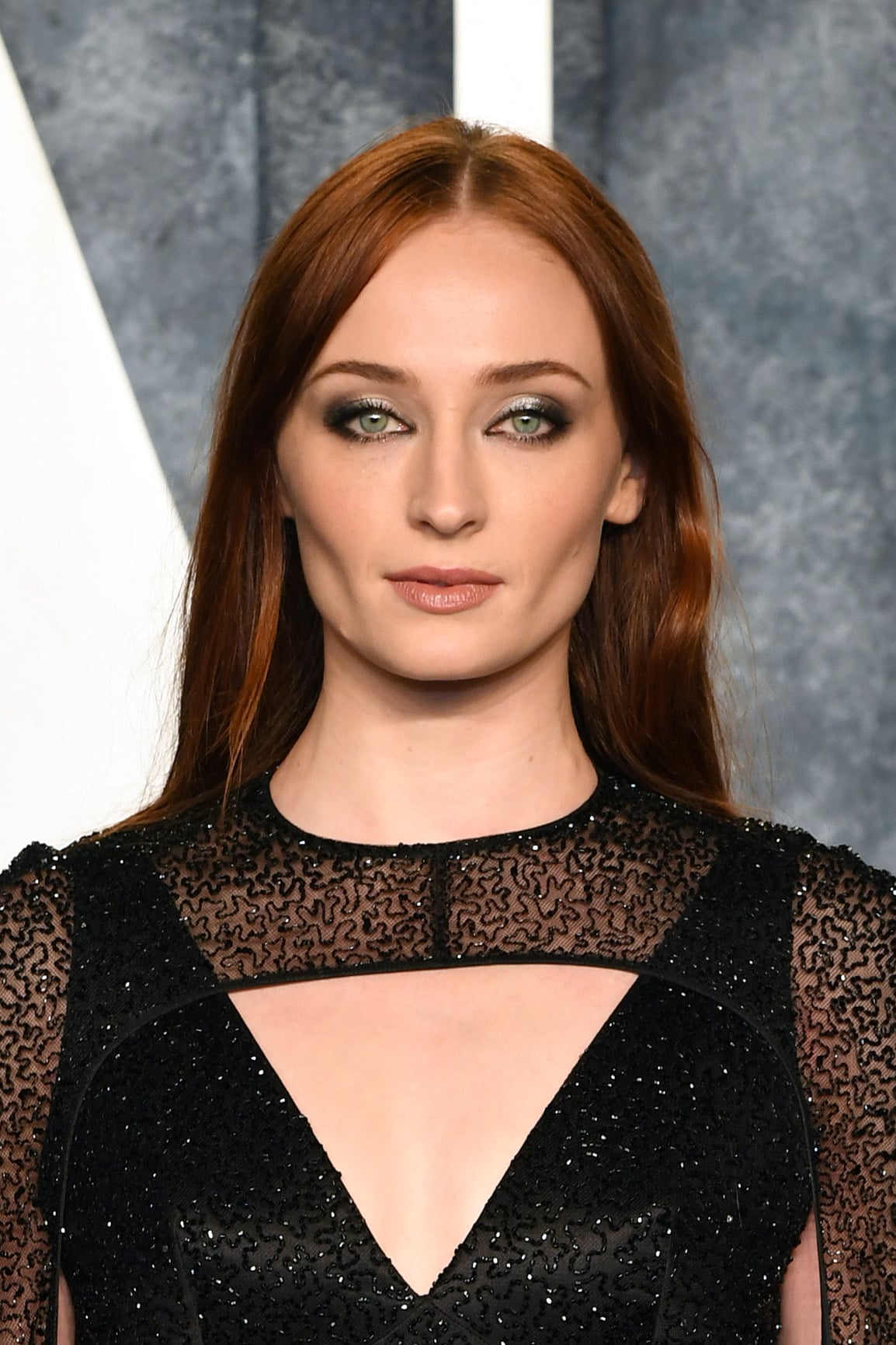 Sophie Turner has red hair at the 2023 Vanity Fair Oscar Party