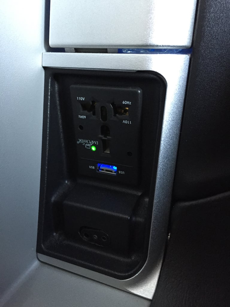 Here's a closer look at the charging station. There are outlets in coach, but they are under the seat and a little trickier to get to.