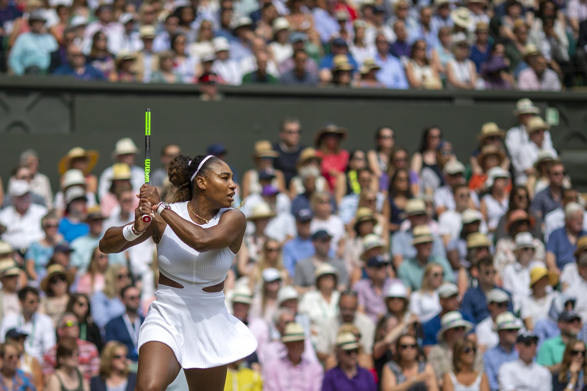 LONDON, ENGLAND - July 13:   Serena Williams of the United States in action against Simona Halep of Romania during the Ladies Singles Final on Centre Court during the Wimbledon Lawn Tennis Championships at the All England Lawn Tennis and Croquet Club at Wimbledon on July 13, 2019 in London, England. (Photo by Tim Clayton/Corbis via Getty Images)