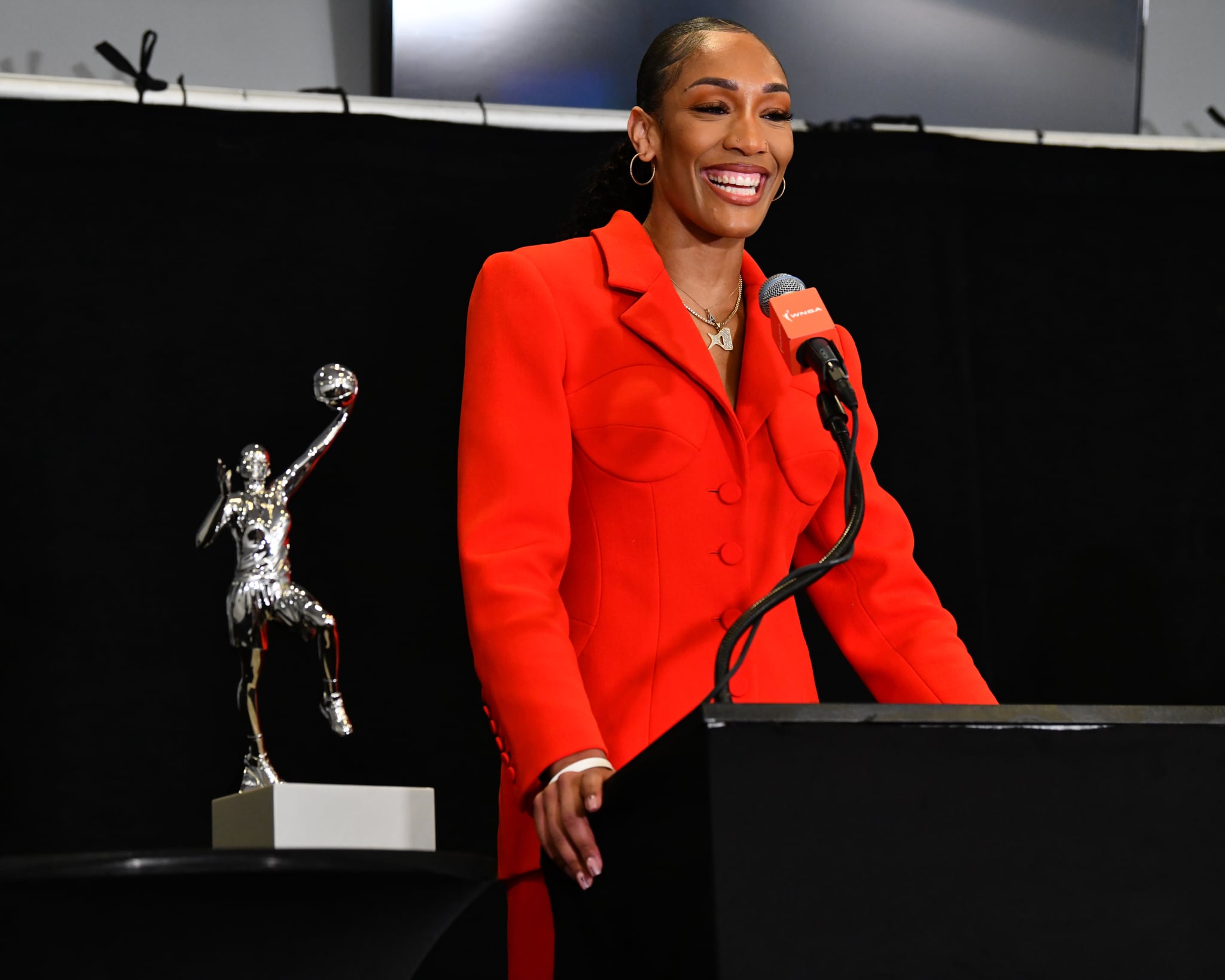 LAS VEGAS, NV - SEPTEMBER 22: A'ja Wilson #22 of the Las Vegas Aces talks to the media after receiving the WNBA Most Valuable Player award before the game against the Seattle Storm during Round one Game one of the 2024 WNBA Playoffs on September 22, 2024 at Michelob ULTRA Arena in Las Vegas, Nevada. NOTE TO USER: User expressly acknowledges and agrees that, by downloading and or using this photograph, User is consenting to the terms and conditions of the Getty Images License Agreement. Mandatory Copyright Notice: Copyright 2024 NBAE (Photo by Barry Gossage/NBAE via Getty Images) LAS VEGAS, NV - SEPTEMBER 22: A'ja Wilson #22 of the Las Vegas Aces talks to the media after receiving the WNBA Most Valuable Player award before the game against the Seattle Storm during Round one Game one of the 2024 WNBA Playoffs on September 22, 2024 at Michelob ULTRA Arena in Las Vegas, Nevada. NOTE TO USER: User expressly acknowledges and agrees that, by downloading and or using this photograph, User is consenting to the terms and conditions of the Getty Images License Agreement. Mandatory Copyright Notice: Copyright 2024 NBAE (Photo by Barry Gossage/NBAE via Getty Images)