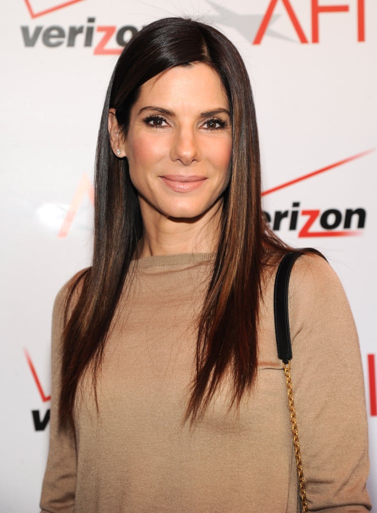 Sandra Bullock's shade, which marries deep umber tones with rich chestnut hues, is the perfect balance of nearly-jet-black and medium brown.