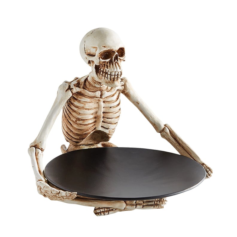 Figural Skeleton Holding Platter