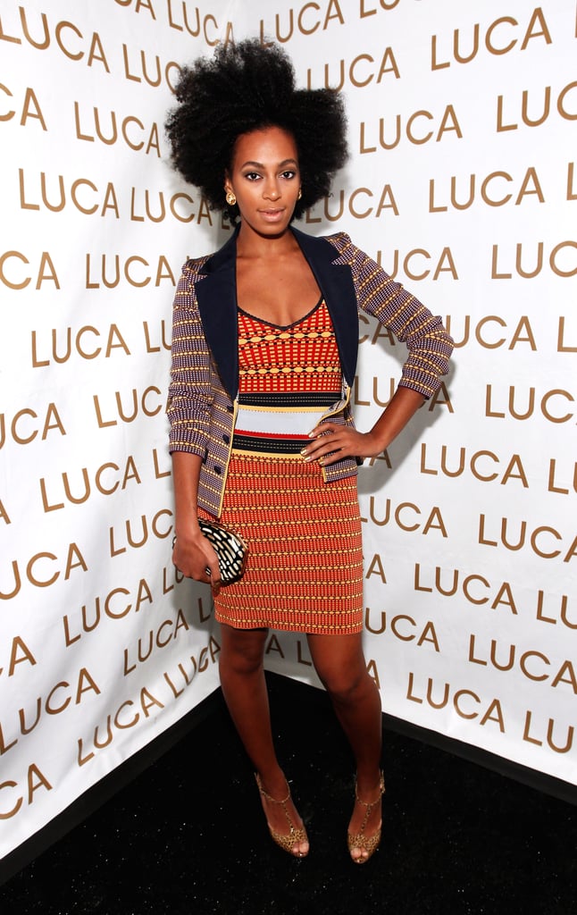 Solange debuted the perfect transitional color palette in an orange, navy, and yellow ensemble at the Luca Luca Spring 2011 show in NYC. The fashion maven topped her knit aztec-print dress with a geometric blazer, then slipped on a pair of t-strap leopard sandals.