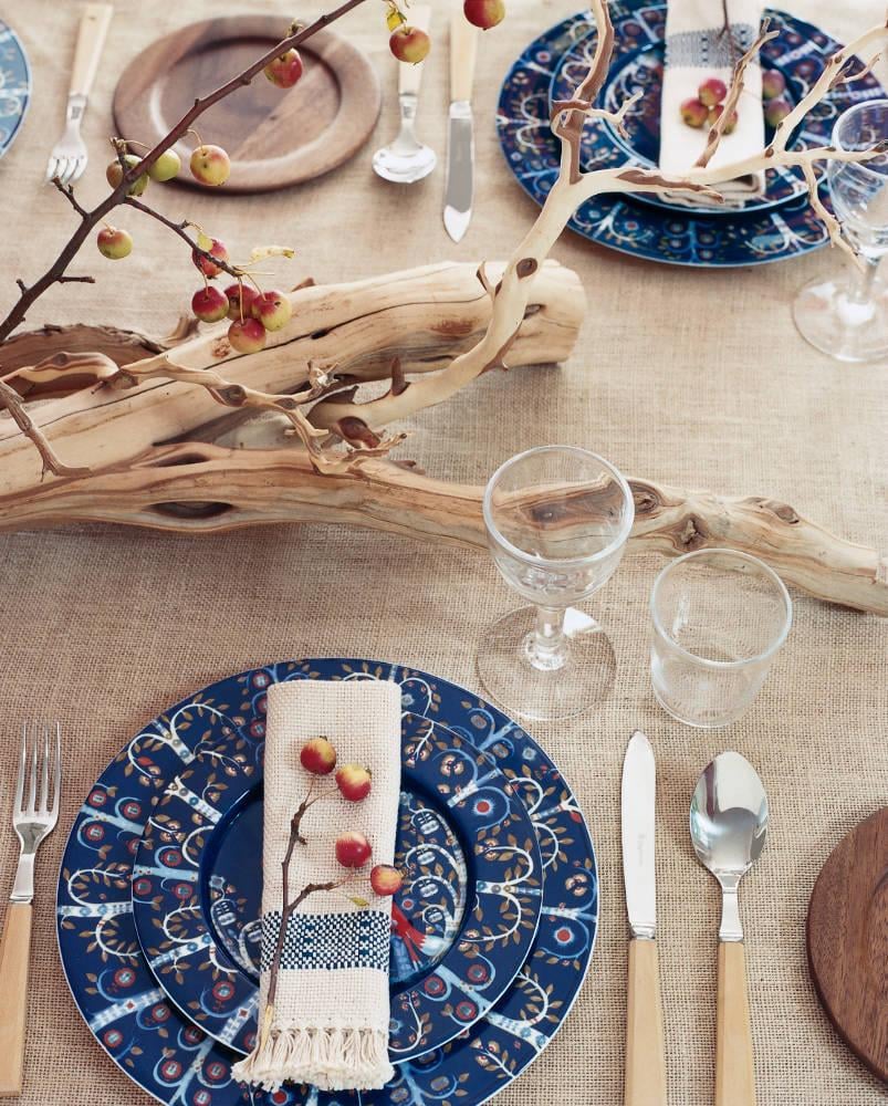 Branches add height and depth to a tabletop like flowers, but they cost a fraction of the price.
