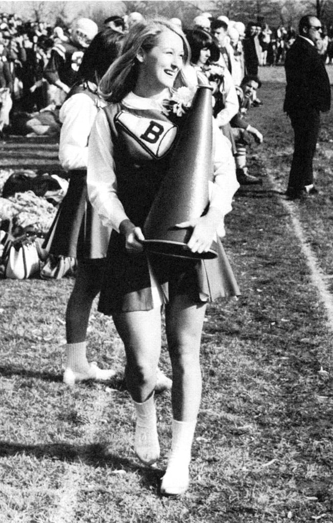 Cheerleader Meryl carried a cone at a game.
Source: Seth Poppel/Yearbook Library