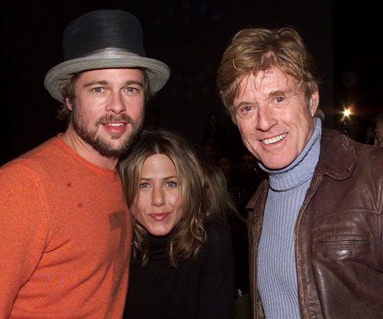 Robert Redford posed with Brad Pitt and Jennifer Aniston before the premiere of The Good Girl during the 2002 festival.