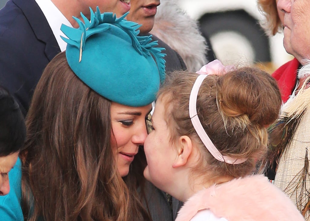 She was greeted with a traditional hongi — the Maori custom of pressing one's nose and forehead to another person — by a young girl as she arrived in New Zealand in April 2014.