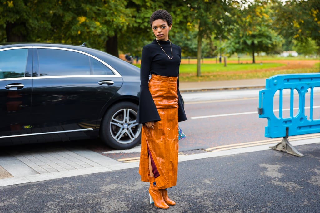 Just like you'd wear black boots with a black skirt, why not do the same but with orange? This style star kept things basic on top, but colorful on the bottom.