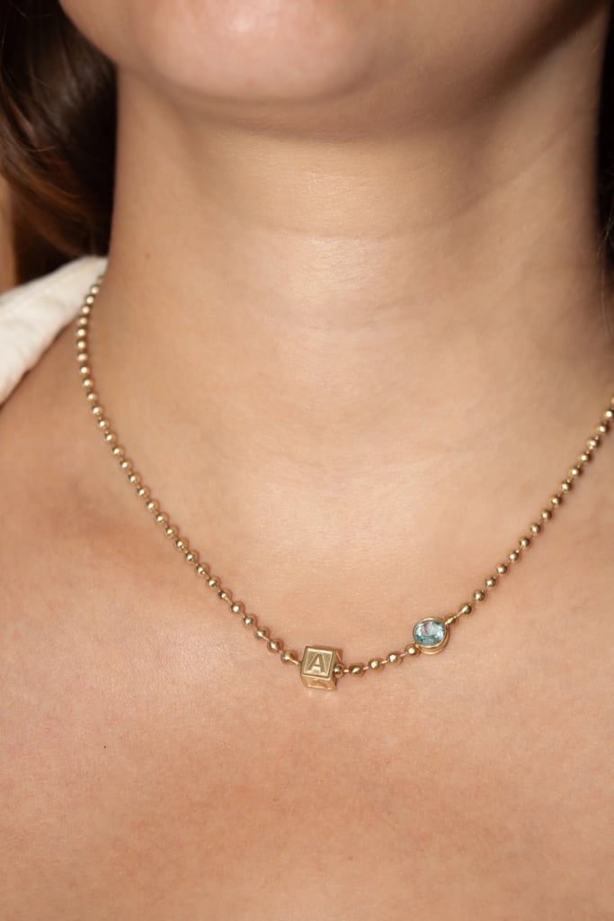 TwentyFour Fine Jewelry 14k Birthstone Baby Letter Block Necklace ($2,900)
"If you're searching for something meaningful that will last forever, the TwentyFour Birthstone Letter Block Necklace is it. It's not cheap, but neither are you, babe! It's stunning, made to order, and is completely customizable. It's a piece you'll have forever." — Renee Rodriguez, senior staff writer and social producer