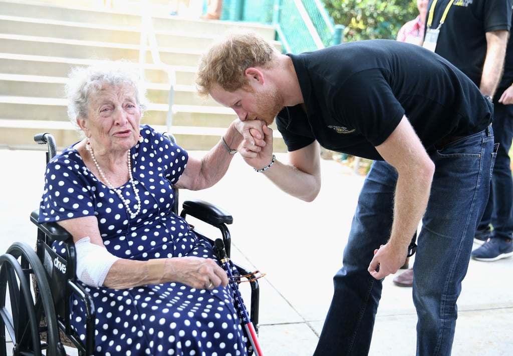Prince Harry Kissing Elderly Woman's Hand at Invictus Games