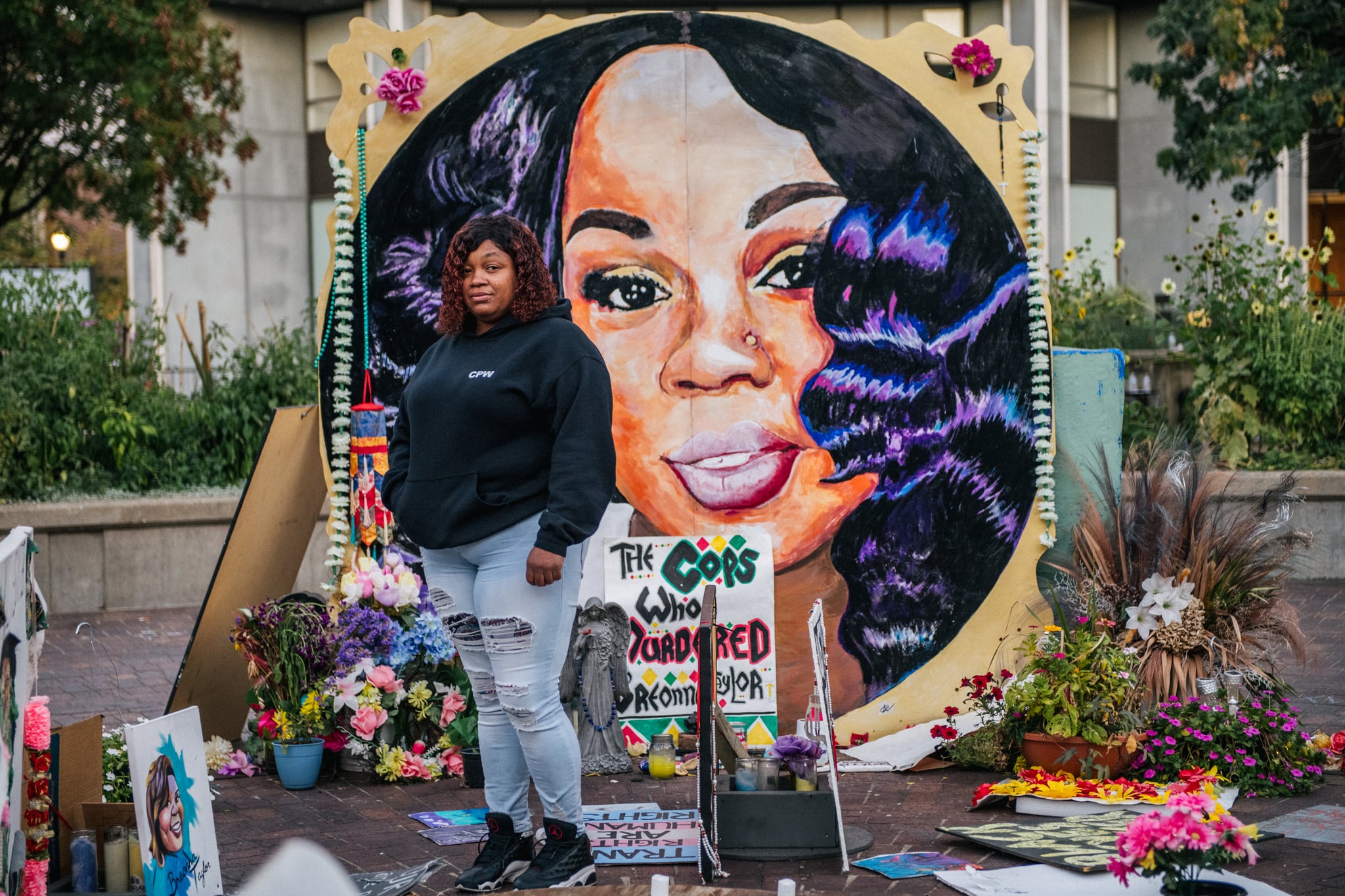 LOUISVILLE, KY - SEPTEMBER 21: Tamika Palmer, mother of Breonna Taylor, poses for a portrait in front of a mural of her daughter at Jefferson Square park on September 21, 2020 in Louisville, Kentucky. Demonstrators gathered to prepare for possible unrest in wake of the Grand Jury decision regarding the officers involved in the killing of Breonna Taylor. Taylor was fatally shot by Louisville Metro Police officers during a no-knock warrant at her apartment on March 13, 2020 in Louisville, Kentucky. Demonstrators have occupied the park for 118 days. (Photo by Brandon Bell/Getty Images)