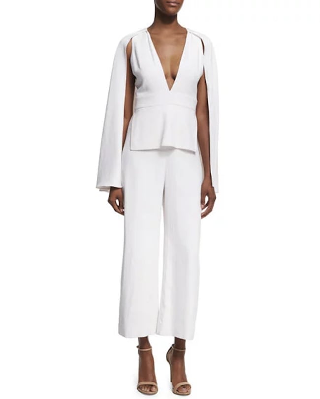 Or, opt for this stunning Cushnie et Ochs Plunging V-Neck Jumpsuit with a Cape ($1,895).  Accessorize with a the perfect pair of metallic heels to add some sparkle to your look.