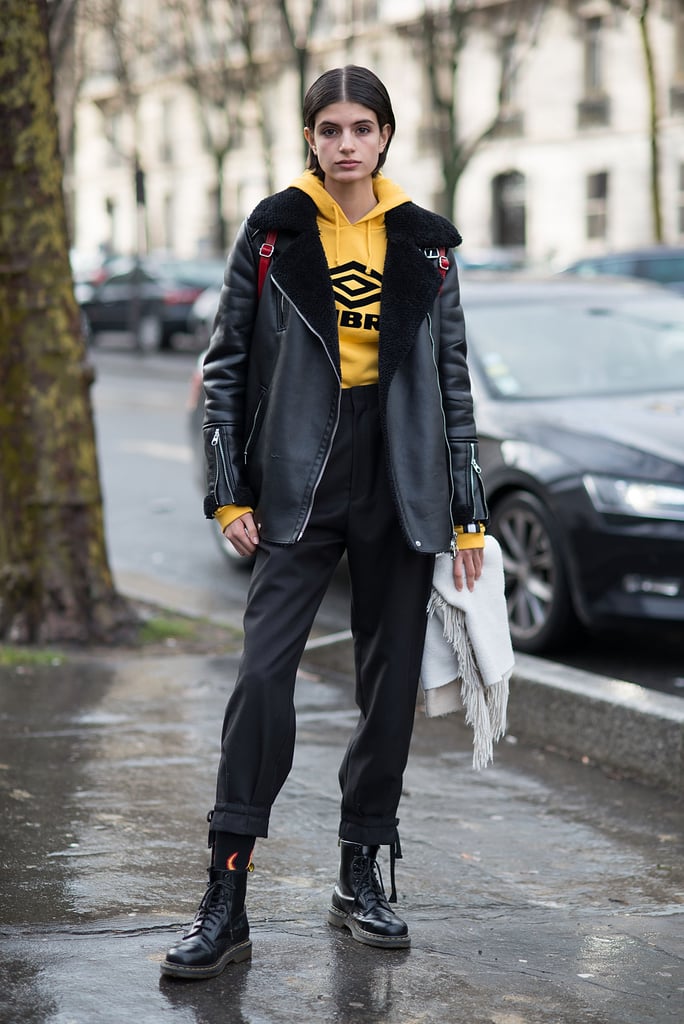 Toughen Up Your Look With a Leather Jacket and a Yellow Hoodie