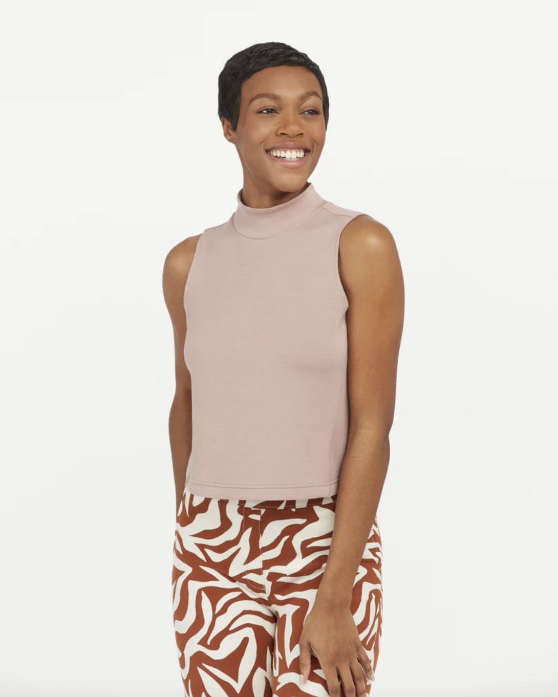 A Cropped Sleeveless Turtleneck Top: Spanx AirEssentials Mock Neck