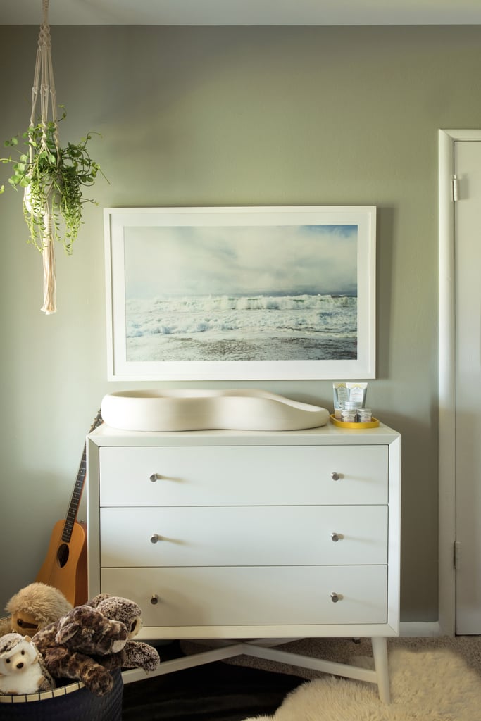 We chose a midcentury-inspired dresser ($589) that can double as clothing storage and a nappy changing station with this Keekaroo Peanut Changer ($130) placed on top.