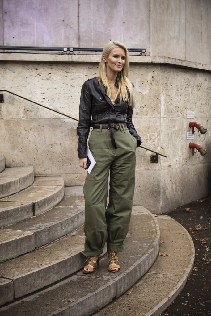 For a casually luxe look, tuck a leather shirt into cargo pants. Lace-up sandals are a summery finish.