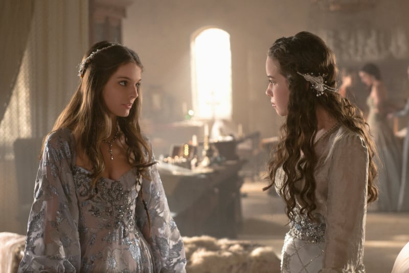 Kenna (Caitlin Stasey) and Lola (Anna Popplewell), Mary's ladies-in-waiting, have a chat.