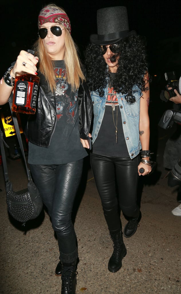 Jessica Alba and Kelly Sawyer were dressed as Axl Rose and Slash at Kate Hudson's Halloween party in 2014.